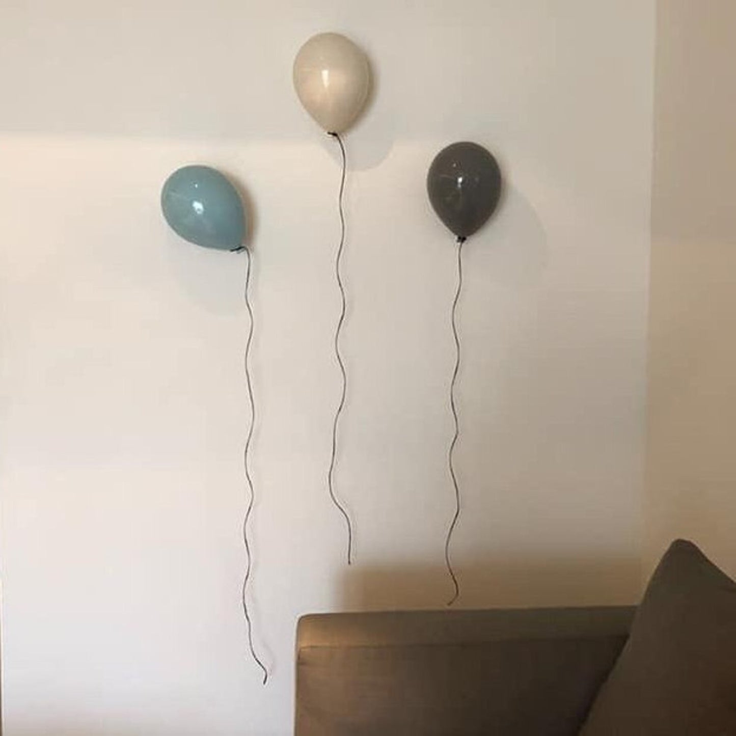 Sky Blue Glossy Ceramic Balloon Sculpture
