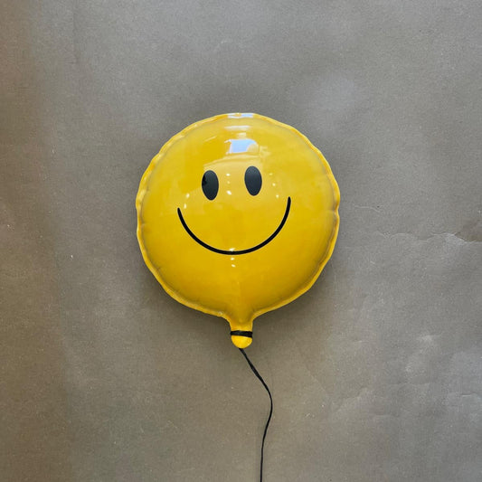 Yellow Smiley Face Ceramic Balloon Sculpture