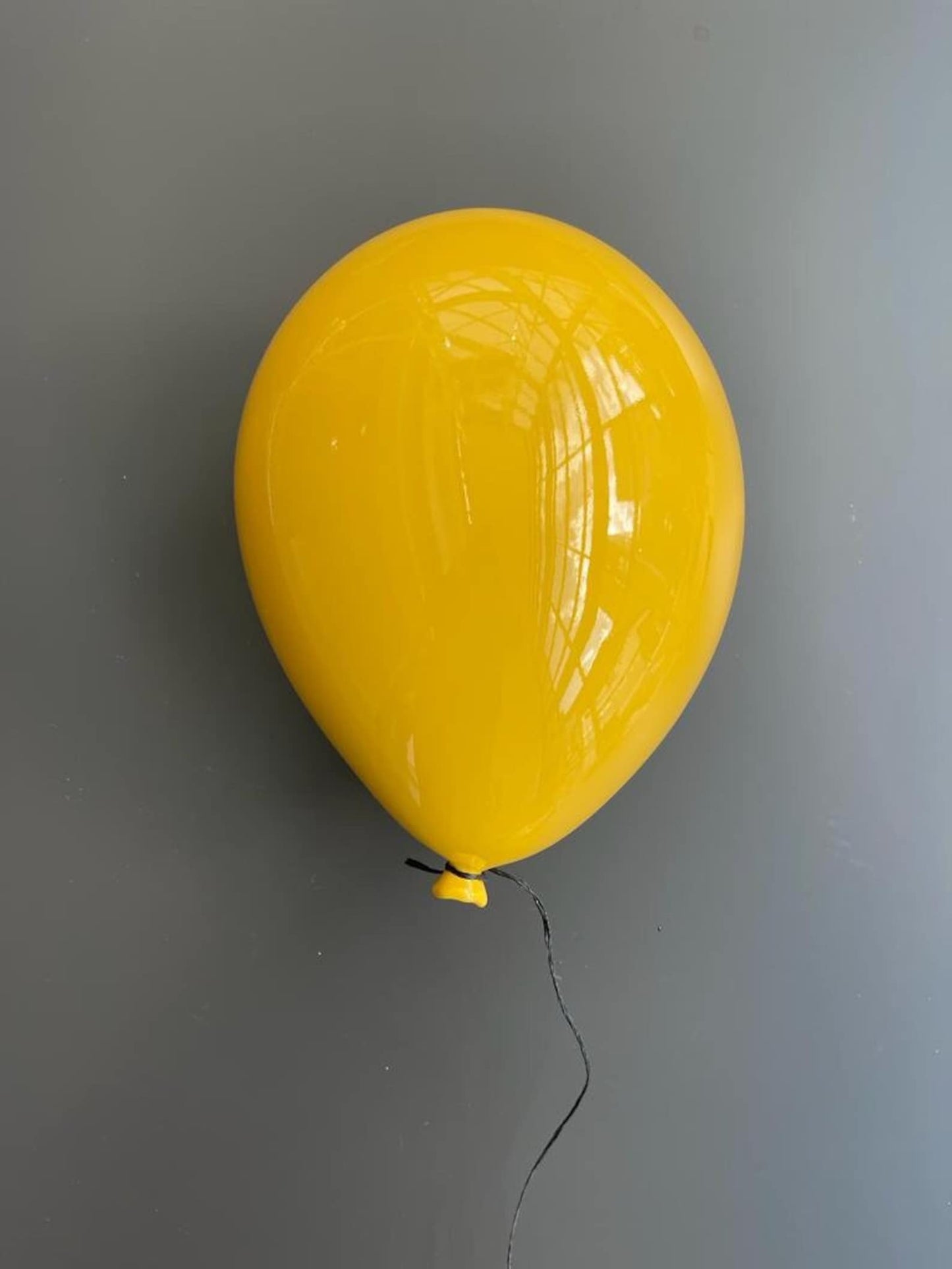 Yellow Glossy Ceramic Balloon Sculpture