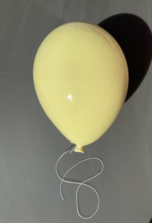 Light Yellow Glossy Ceramic Balloon Sculpture